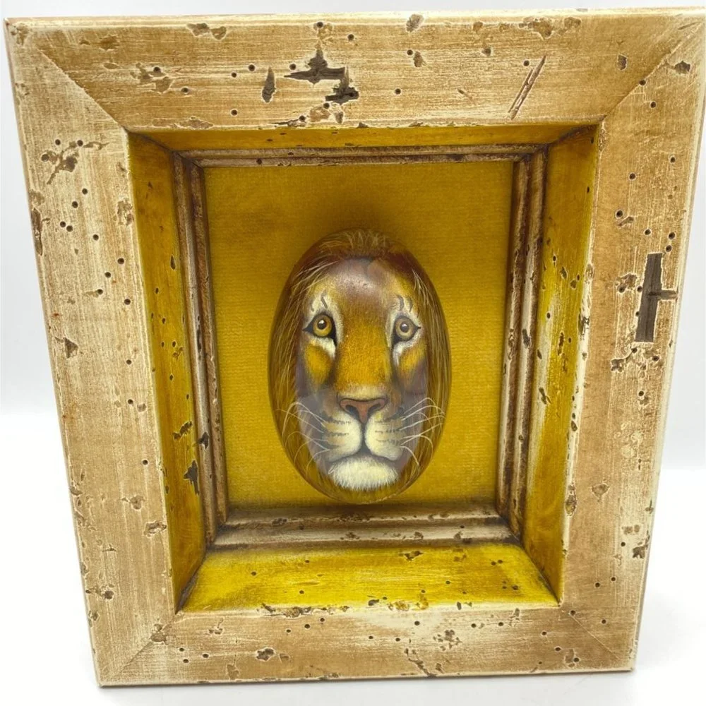 African hand painted lions face on stone egg framed signed Searcy rustic